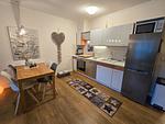 Küche / Küchenzeile - Komfortplus Ferienwohnung mit 1 Schlafzimmer und Balkon im Obergeschoss (181) - Top-Hundeurlaub