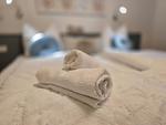Bett - Komfortplus Ferienwohnung mit 1 Schlafzimmer und Balkon im Obergeschoss (181) - Top-Hundeurlaub