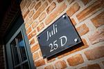 Dekoratives Detail - Juli - Top-Hundeurlaub