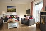 Wohnzimmer - Haus Westwind - Top-Hundeurlaub