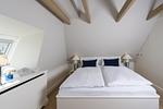 Schlafzimmer - Süderstraße 11 - Top-Hundeurlaub