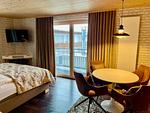 Familienzimmer mit separatem Schlafzimmer mit Balkon inklusive Frühstück - Top-Hundeurlaub