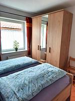 Schlafzimmer - Ferienwohnung Fledderweg 23a - Top-Hundeurlaub