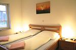 Schlafzimmer - Ferienwohnung Seehundstr. 1b - Top-Hundeurlaub