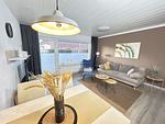 Wohnzimmer - Ferienwohnung Ostfriesenmuschel - Top-Hundeurlaub