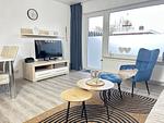 Wohnzimmer - Ferienwohnung Ostfriesenmuschel - Top-Hundeurlaub