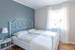 Freundliches Schlafzimmer im Neubau-Ferienhaus Villa Vita – Urlaub mit Hund an der Ostsee möglich - Villa Vita - Top-Hundeurlaub