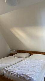 Schlafzimmer - Hus op de Wurth Ferienwohnung Seeblick - Top-Hundeurlaub