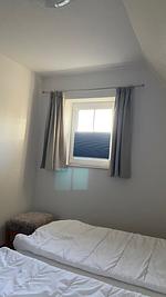 Schlafzimmer - Hus op de Wurth Ferienwohnung Seeblick - Top-Hundeurlaub