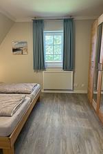 Schlafzimmer - Hus op de Wurth Ferienwohnung 17 - Godewind - - Top-Hundeurlaub