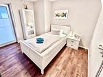 Schlafzimmer mit Einzelbett - Wohnung HF 12 - "Luftsnapper´s" - Top-Hundeurlaub