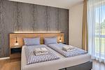 Schlafzimmer - Ferienwohnung Goldammer 03 im Wreecher Idyll Rügen - Top-Hundeurlaub