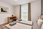 Schlafzimmer - Ferienwohnung Grünfink 04 im Wreecher Idyll Rügen - Top-Hundeurlaub