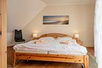 Schlafzimmer mit Doppelbett - Wohnung 2.4 - Familientraum - Top-Hundeurlaub