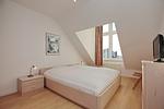 erstes Schlafzimmer mit Doppelbett - Wohnung 120 - Top-Hundeurlaub