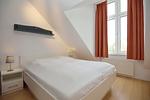 zweites Schlafzimmer mit Doppelbett - Wohnung 120 - Top-Hundeurlaub