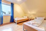 Schlafzimmer - Ferienhaus Krabbe - Top-Hundeurlaub