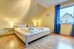 Schlafzimmer - Ferienhaus Krabbe - Top-Hundeurlaub