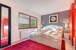 Schlafzimmer mit großen Doppelbett - Ferienwohnung Kieferngrund - Top-Hundeurlaub