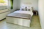 Schlafzimmer - App. Nähstube nur 100 m zum Strand mit Terrasse - Top-Hundeurlaub
