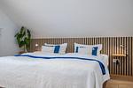 Schlafzimmer mit Doppelbett - Reihenhaus 6 - Delfin - Top-Hundeurlaub