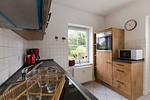 Küche / Küchenzeile - Appartement  Kiebitzstieg 22 Wohnung 8 - Top-Hundeurlaub