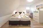 Schlafzimmer - Up Süderdün Ferienwohnung 2 - Top-Hundeurlaub