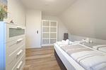 Schlafzimmer - Up Süderdün Ferienwohnung 2 - Top-Hundeurlaub