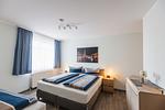 Schlafzimmer - Inselglück Apartment 1 - Top-Hundeurlaub