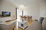 Wohnzimmer mit TV - Wohnung 01 - Top-Hundeurlaub
