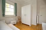 2. Schlafzimmer mit Schrank - Wohnung 01 - Top-Hundeurlaub