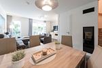 Wohn-Essbereich mit Esstisch und Sitzgelegenheit - NordseeResort Friesland 38 - Top-Hundeurlaub