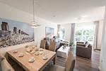Wohn-Essbereich mit Esstisch und Sitzgelegenheit - NordseeResort Friesland 38 - Top-Hundeurlaub