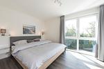 Schlafzimmer mit Doppelbett - NordseeResort Friesland 38 - Top-Hundeurlaub