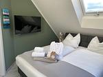 Schlafzimmer - Küstenwaldbude luv - Top-Hundeurlaub