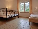 Schlafzimmer - Ferienwohnung NH13 - Top-Hundeurlaub