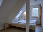 Schlafzimmer - Ferienwohnung NH15 - Top-Hundeurlaub