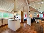 Wohnzimmer mit Blick zur Küche - Ferienhaus 04 - Top-Hundeurlaub