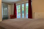 zweites Schlafzimmer mit Zugang zur Süd-Terrasse - Wohnung 01 - Top-Hundeurlaub