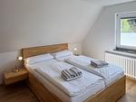 Schlafzimmer - Ferienwohnung *Üüs Aran 7* - Top-Hundeurlaub