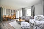 Wohnzimmer mit Blick zum Essbereich - Wohnung 10 - Top-Hundeurlaub