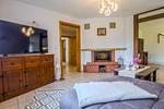 Wohnzimmer mit Kamin - Ferienwohnung im Landmannsheim - Top-Hundeurlaub