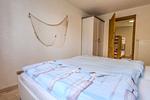 Schlafzimmer mit Doppelbett - Ferienwohnung im Landmannsheim - Top-Hundeurlaub