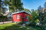 Außenansicht eines charmanten roten Ferienhauses - Kleine Rotbuche - Top-Hundeurlaub