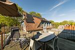 Terrasse mit Tisch und Sonnenschirm - Haus am Schilf - Wohnung 7 - Top-Hundeurlaub