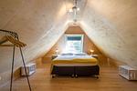 Gemütliches Schlafzimmer mit Dachschräge - Haus am Schilf - Wohnung 6 - Top-Hundeurlaub