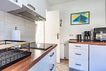 Moderne Küche mit Holzoberflächen und Geräten - Sonnenblumenhaus 01 - Top-Hundeurlaub