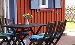 Terrasse mit Tisch und Stühlen - Klönhus - Top-Hundeurlaub