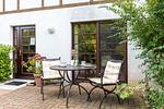 Terrasse mit Tisch und Stühlen - Christian - Top-Hundeurlaub
