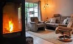 Gemütliches Wohnzimmer mit Kamin - SiebenFinken - Top-Hundeurlaub